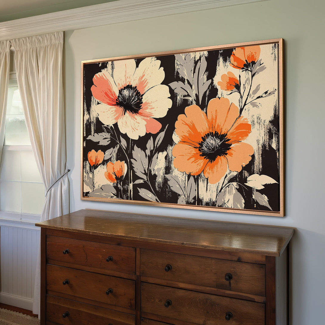 Framed Wall Art featuring vibrant floral design in orange, black, and cream, perfect for adding a pop of color to your home decor.