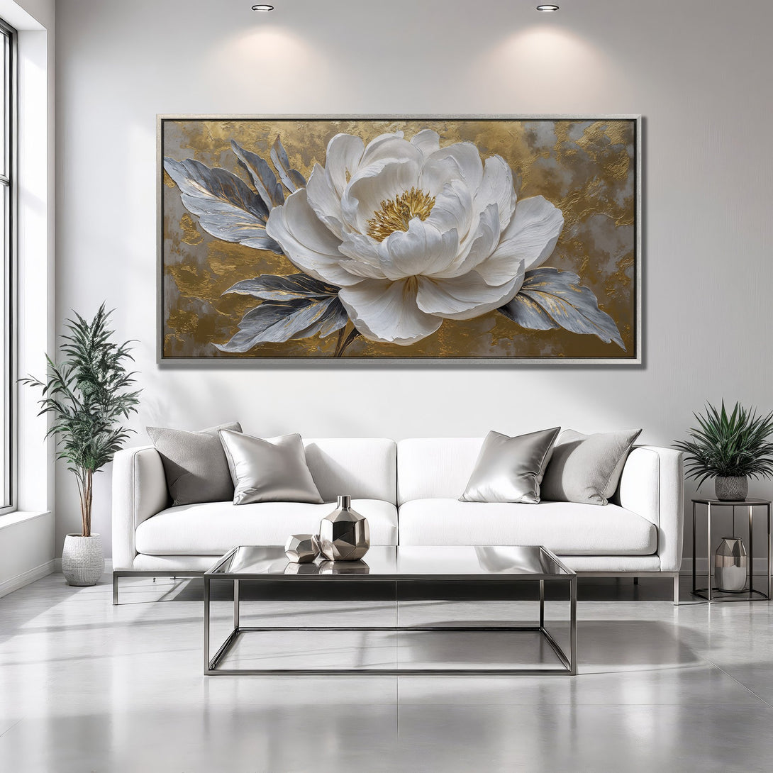 Framed Wall Art featuring a large white flower painting with gold and gray accents, adding elegance to a modern interior.