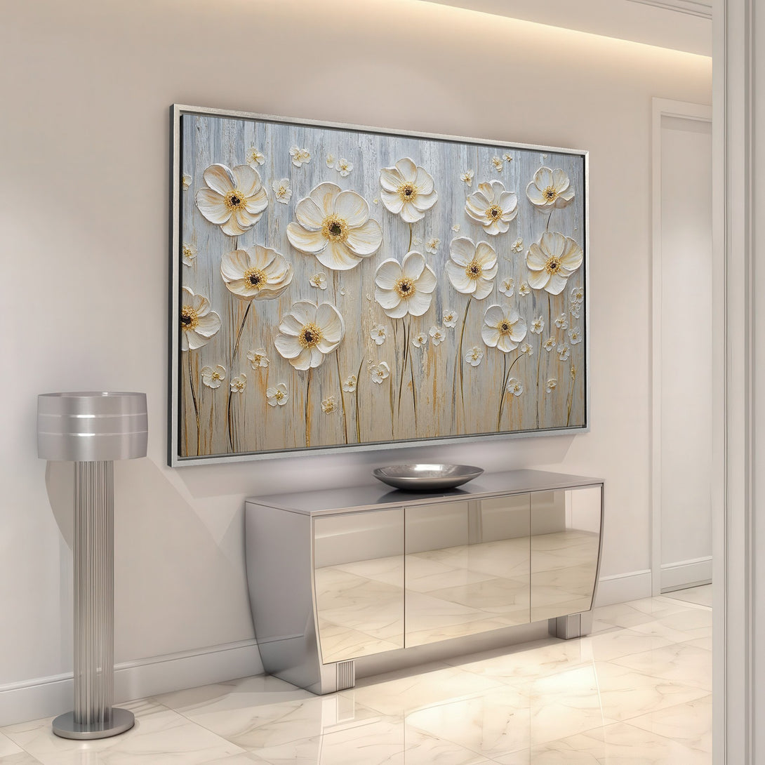 Framed Wall Art featuring white floral textured artwork. Modern style, neutral color palette. Perfect for adding elegance to any space.
