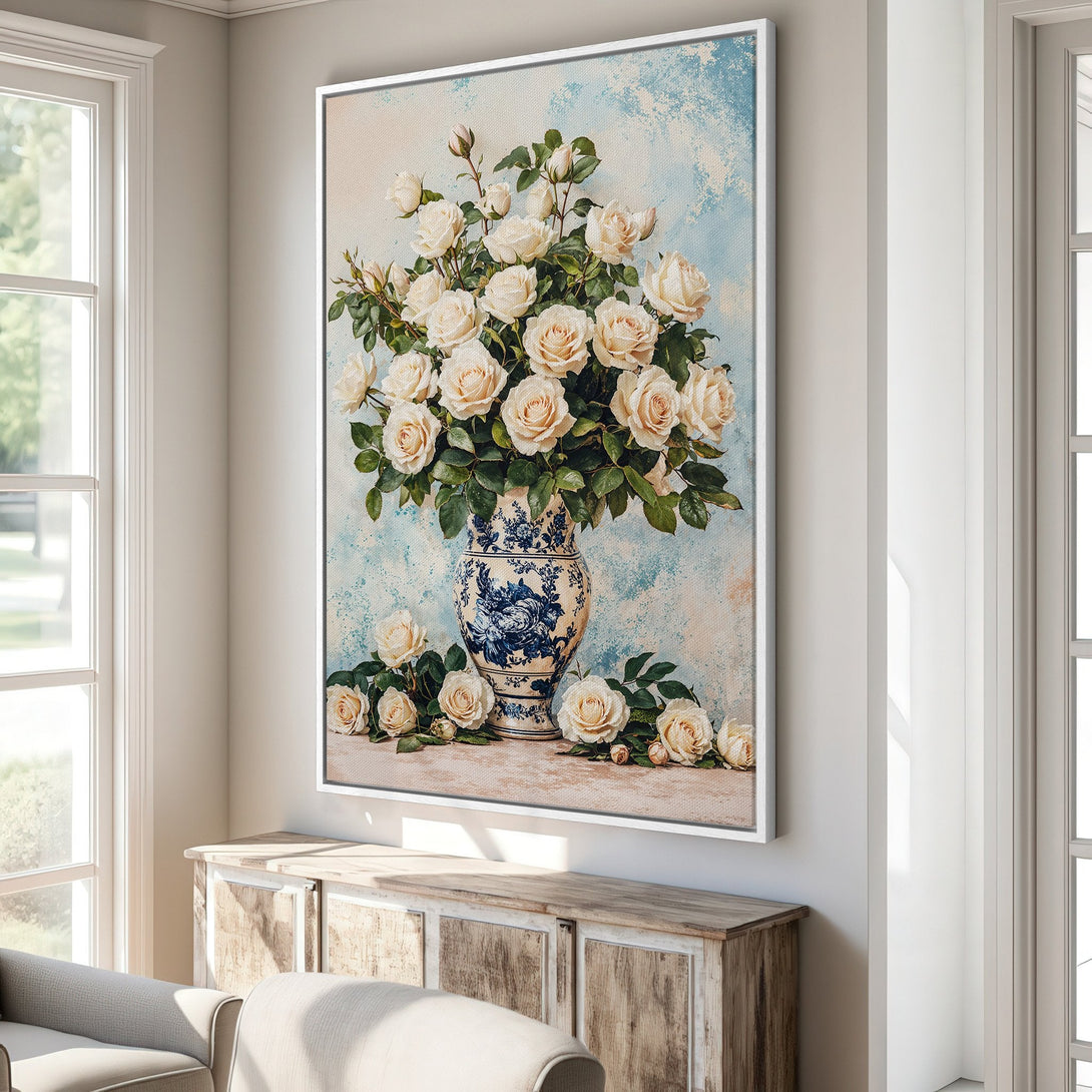 Framed Wall Art featuring a floral still life of white roses in a blue and white vase. Soft, pastel color palette, perfect for adding elegance to any space.