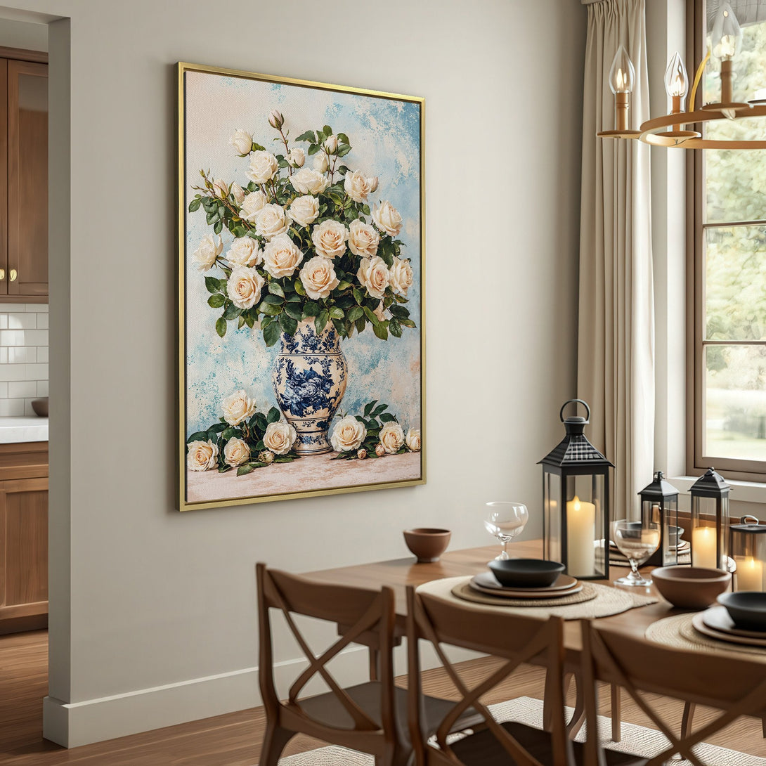 Canvas Print of white roses in a blue and white vase, displayed in a rustic interior. Soft, neutral color palette. Add floral elegance to your home!