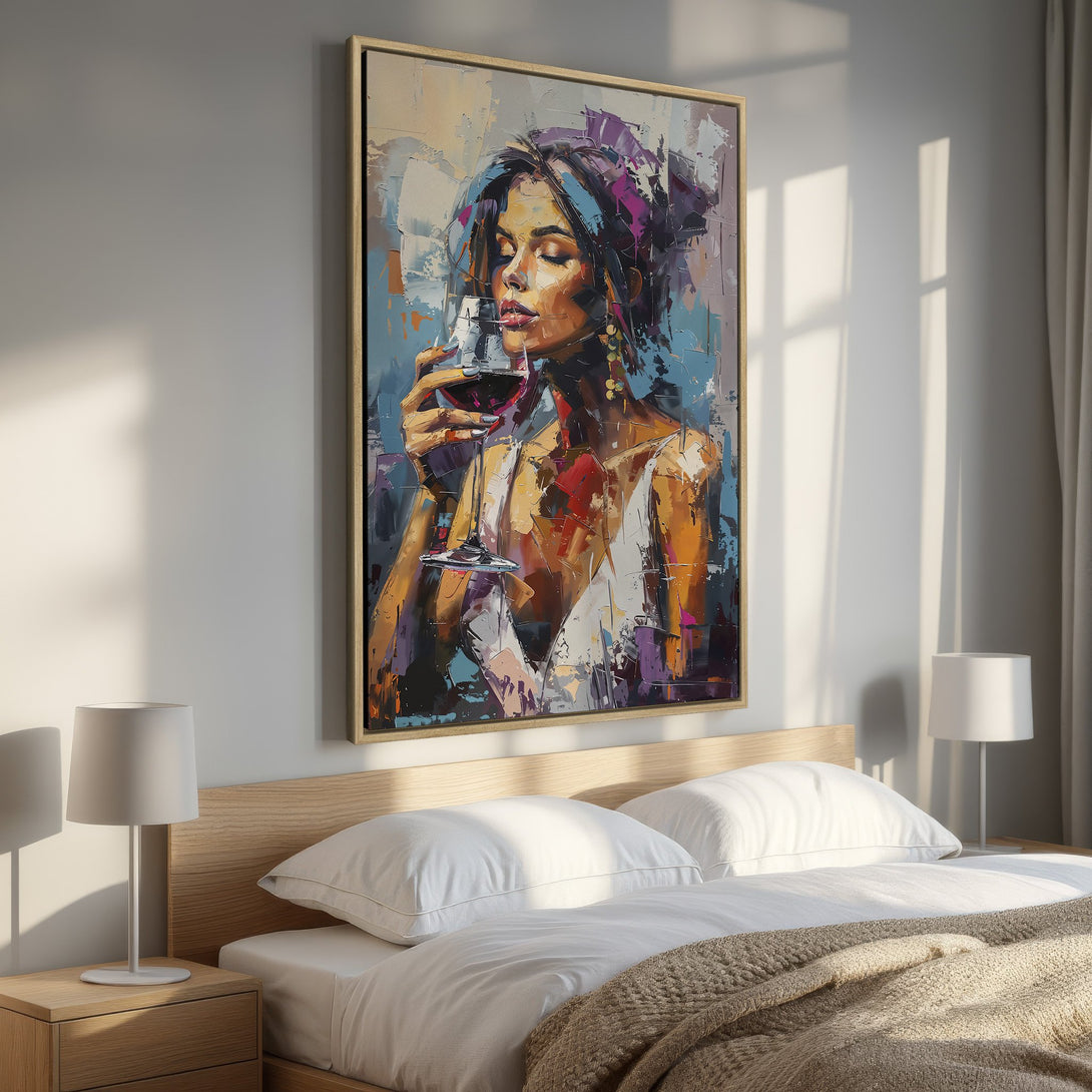 Framed Wall Art: Abstract woman enjoying wine. Rich color palette of blues, purples, and oranges. Perfect for bedroom decor.