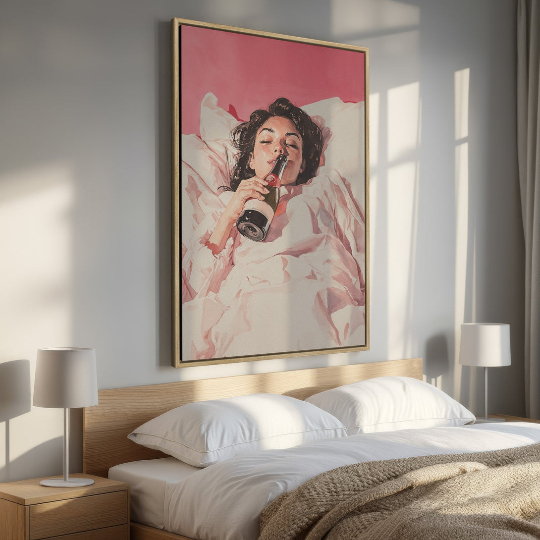 Framed Wall Art: Relaxing woman in bed with a bottle. Watercolor style art in a pink and neutral color palette. Perfect for bedroom decor.