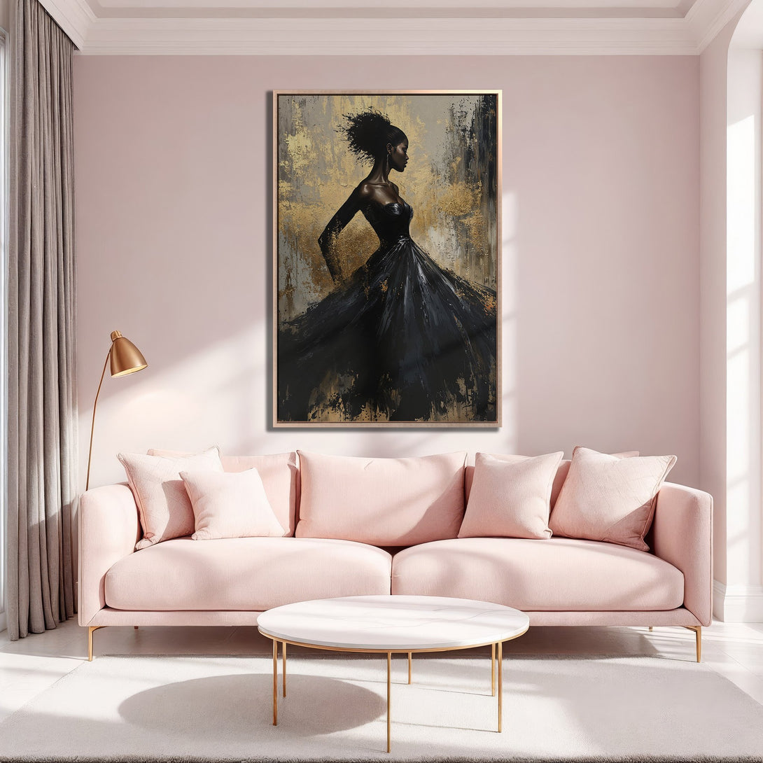 Framed Wall Art: Elegant black dress painting with gold accents, displayed in a modern living room. Features a blush and gold color palette, perfect for stylish decor.