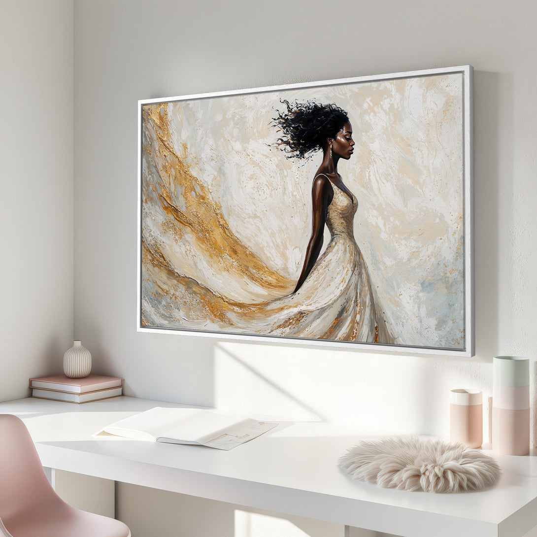Framed Wall Art featuring an elegant woman in a flowing gown. Abstract style with a gold, cream, and neutral color palette. Perfect for modern decor.