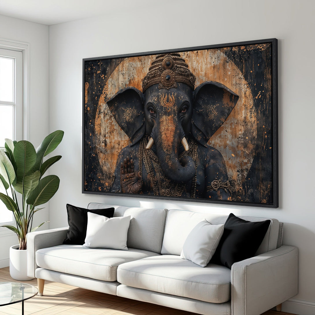 Framed Wall Art: Ganesha Canvas Print in a modern interior. Features a detailed, artistic elephant portrait in a black, gold, and bronze color palette.