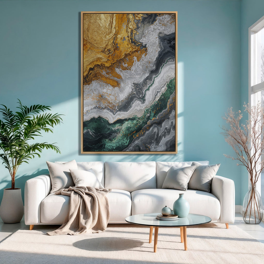 Framed Wall Art: Abstract gold, green, and gray canvas print in a modern living room. Adds a touch of elegance with a cool color palette.