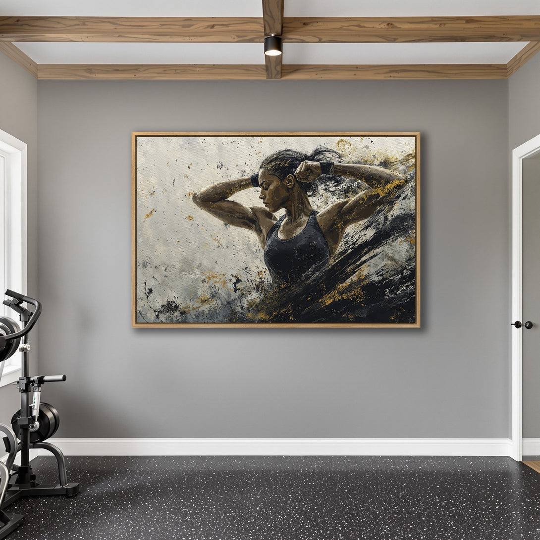 Framed Wall Art featuring an abstract painting of a woman athlete. Modern style with a black, gold, and gray color palette. Perfect for home gym decor.