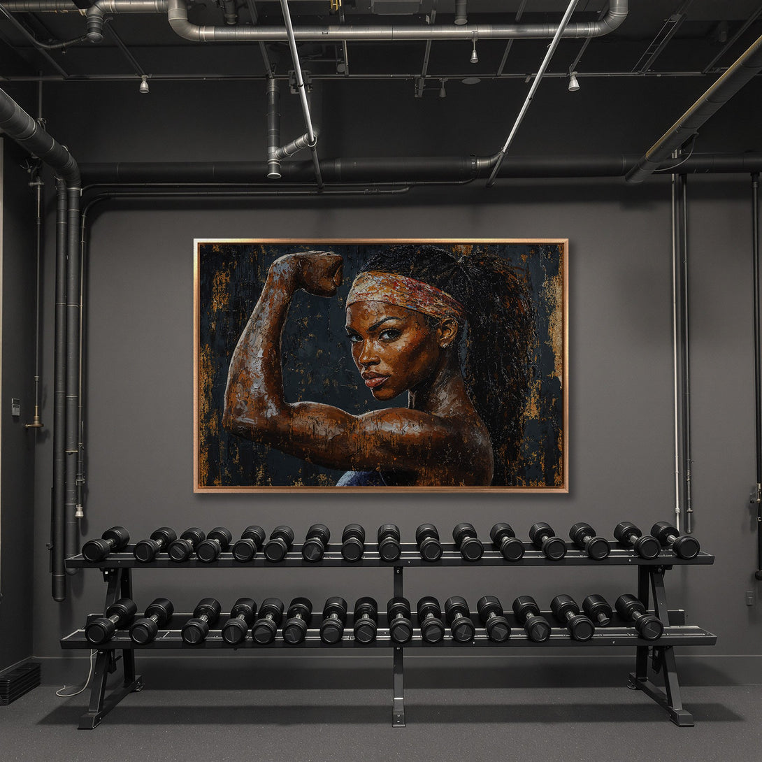 Framed Wall Art featuring a strong woman flexing, with a dark, textured style and a rich, earthy color palette. Perfect for your home gym!