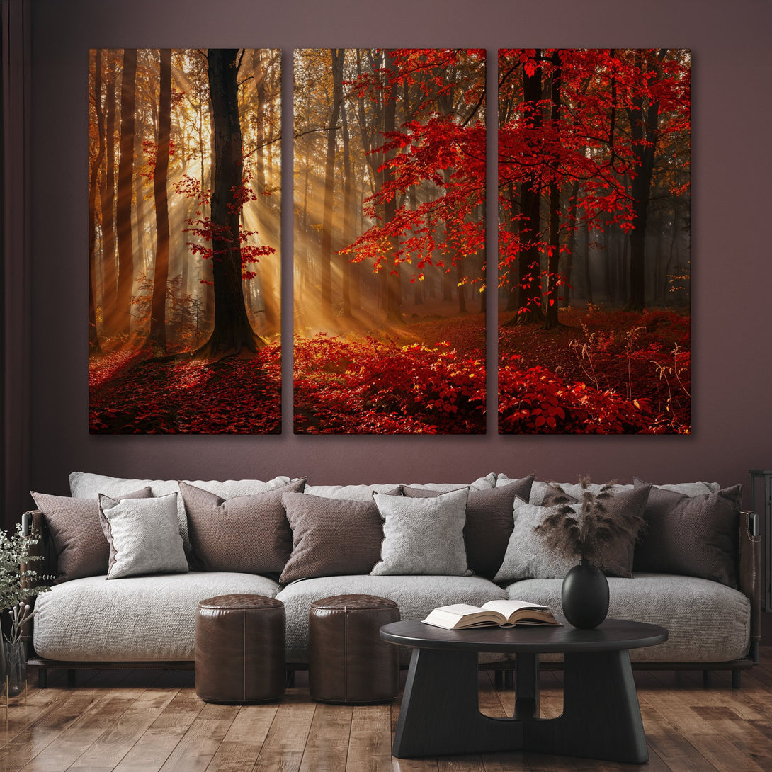 Stunning Canvas Print of a sunlit autumn forest. Warm, vibrant red and gold color palette creates a cozy, inviting atmosphere for your home.