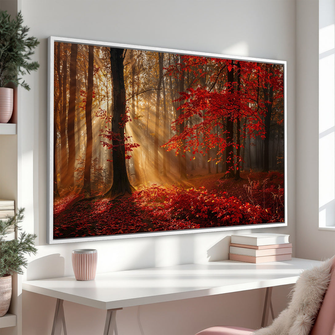 Framed Wall Art of a vibrant autumn forest scene. Warm, inviting color palette of red, orange, and gold. Perfect for adding a touch of nature to your home.