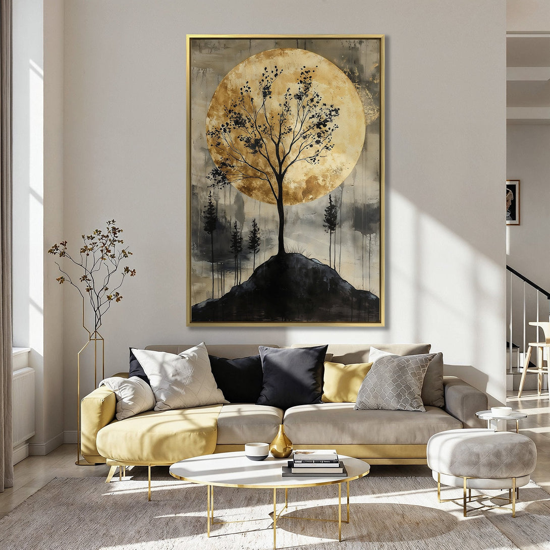 Canvas Print of a tree silhouetted against a golden moon. Rustic style with neutral and black tones, perfect for adding warmth to your space.