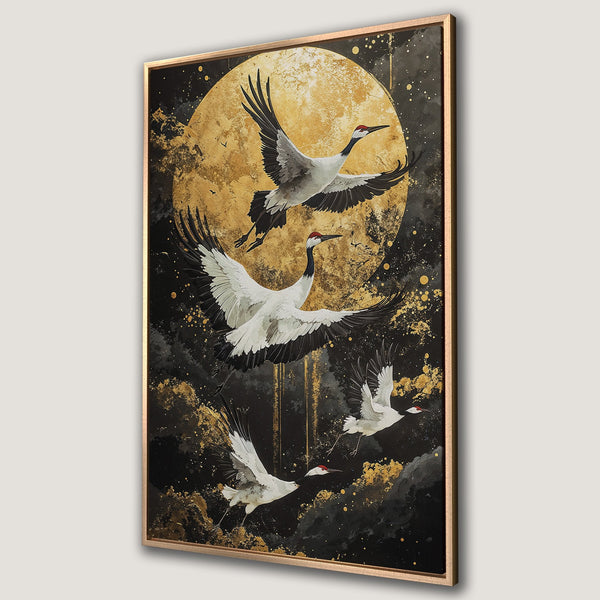 Framed Wall Art featuring elegant cranes in flight against a gold and black abstract background. Adds a touch of zen to any space.