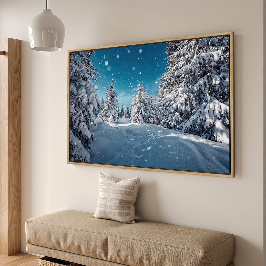Framed Wall Art: Winter forest scene Canvas Print with snowy trees, blue sky, and neutral color palette. Perfect for adding a touch of nature indoors.