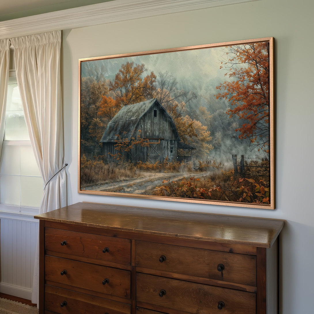 Framed Wall Art featuring a rustic barn scene with autumn colors. Warm, inviting landscape art for your home decor, with a natural, vintage style.