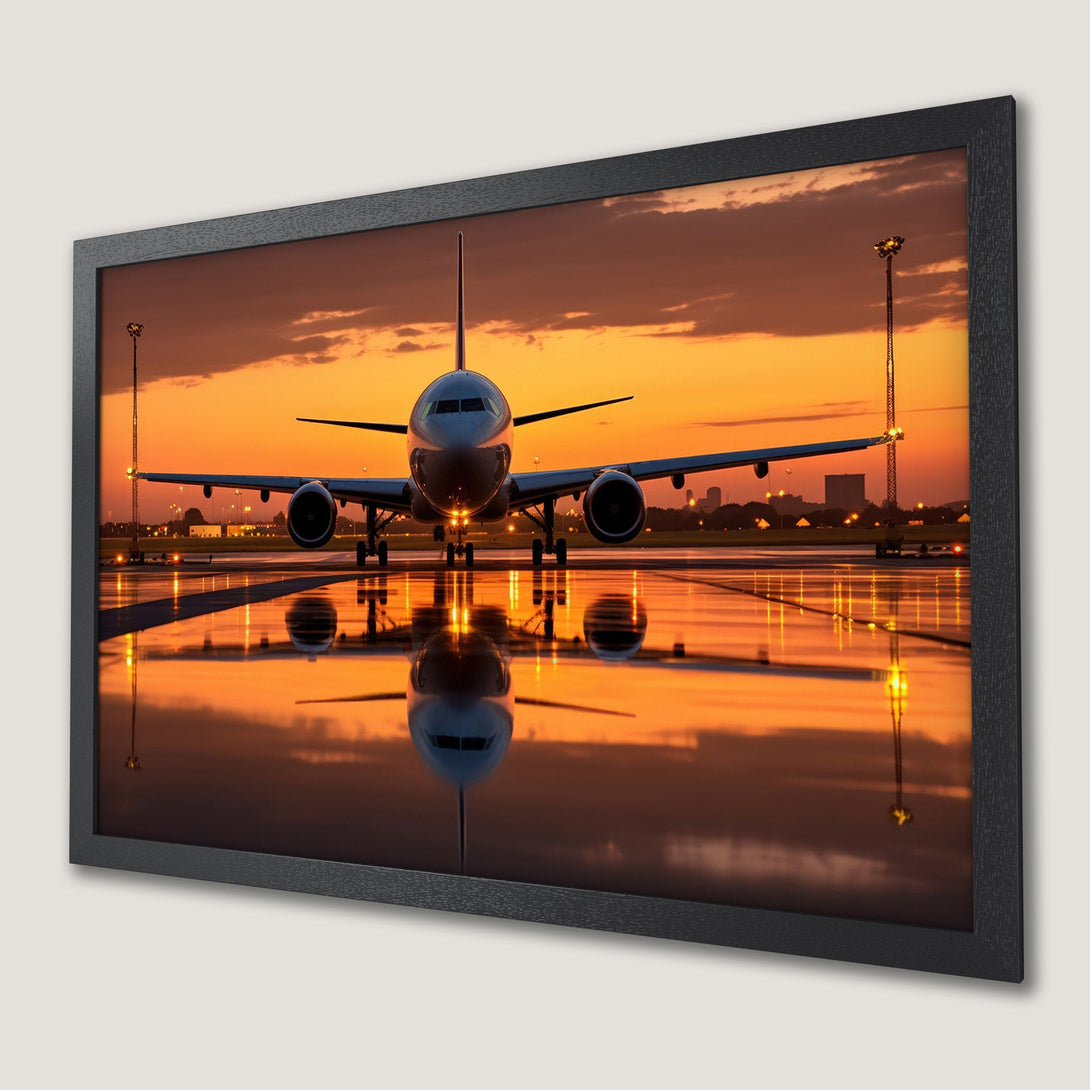 Framed Poster of airplane at sunset. Dramatic style with warm orange and yellow hues. Perfect aviation art.