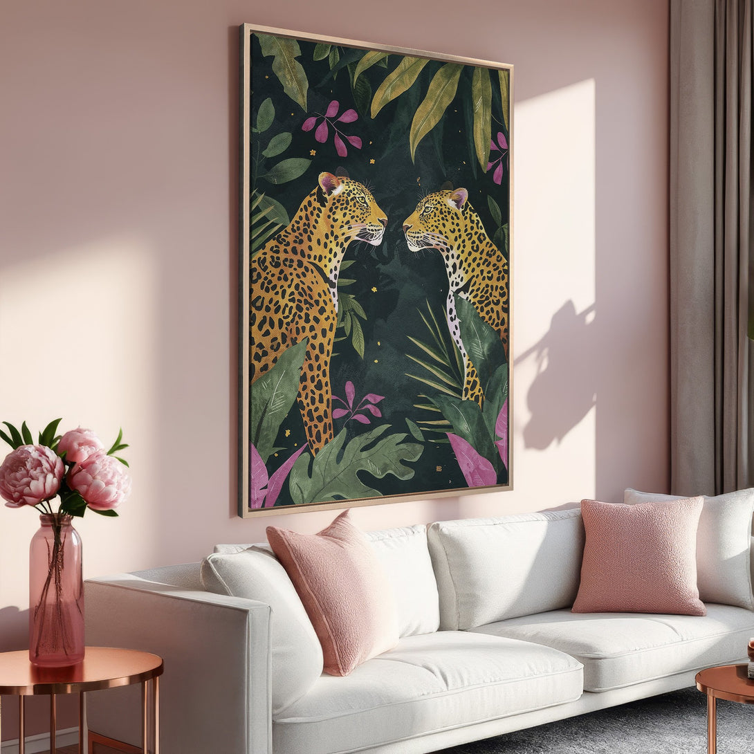 Framed Wall Art featuring two leopards in a jungle scene. Modern, botanical style with a green, pink, and gold color palette. Perfect for home decor.