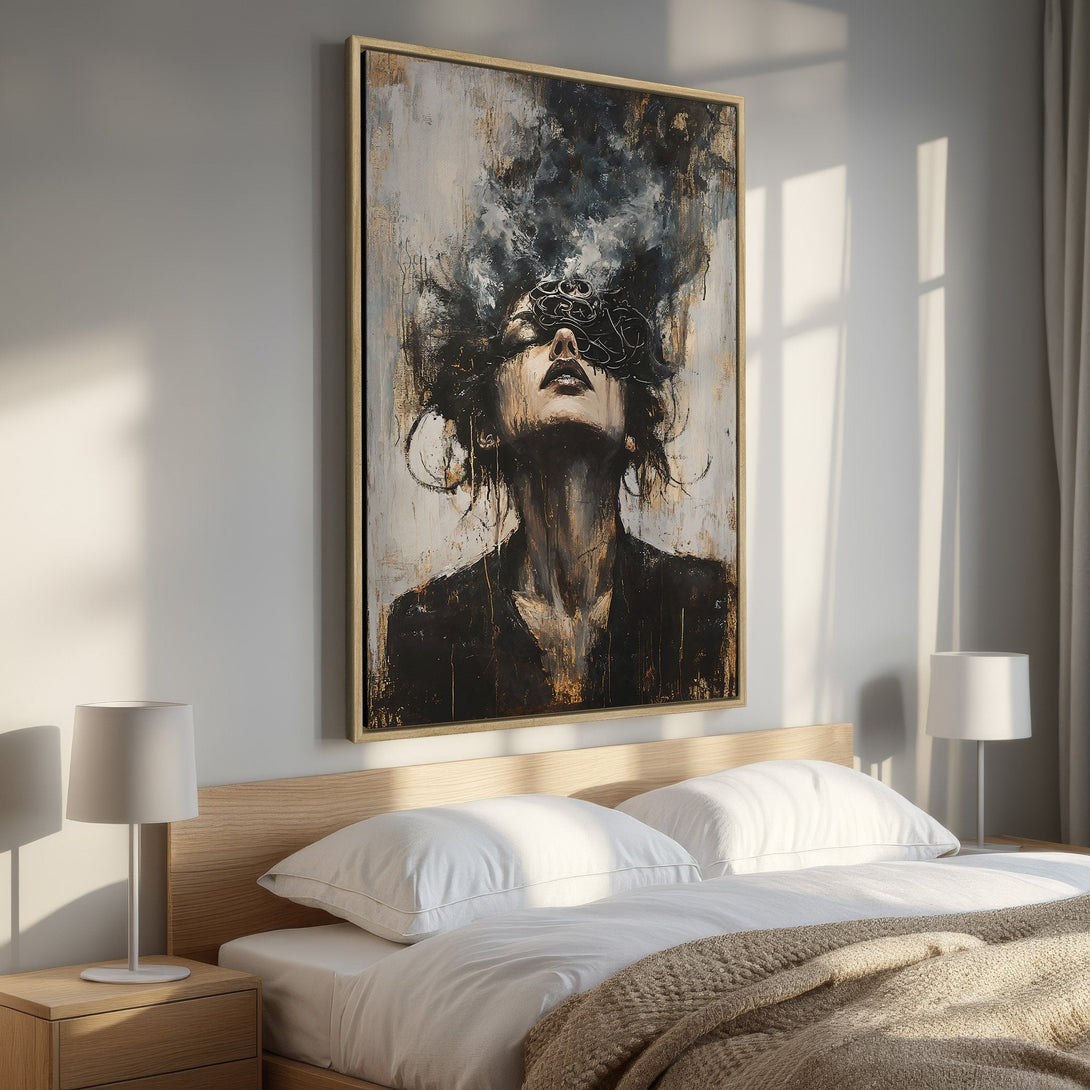 Framed Wall Art: Abstract portrait Canvas Print in a bedroom. Moody, expressive art with black, gold, and neutral tones for a stylish interior.