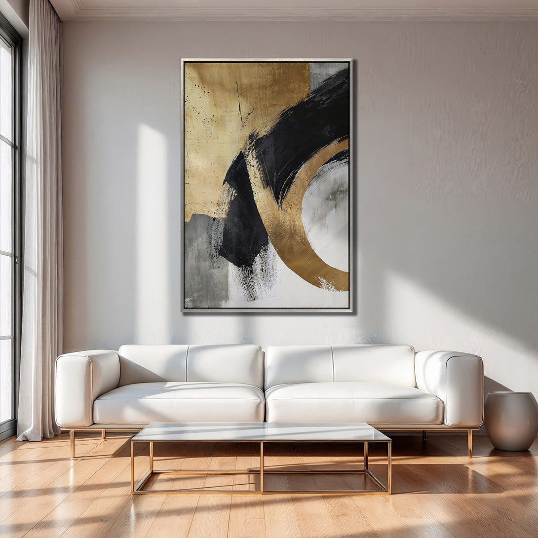 Abstract Canvas Print in gold, black, and gray, displayed in a modern living room. Elevate your space with stylish wall art!