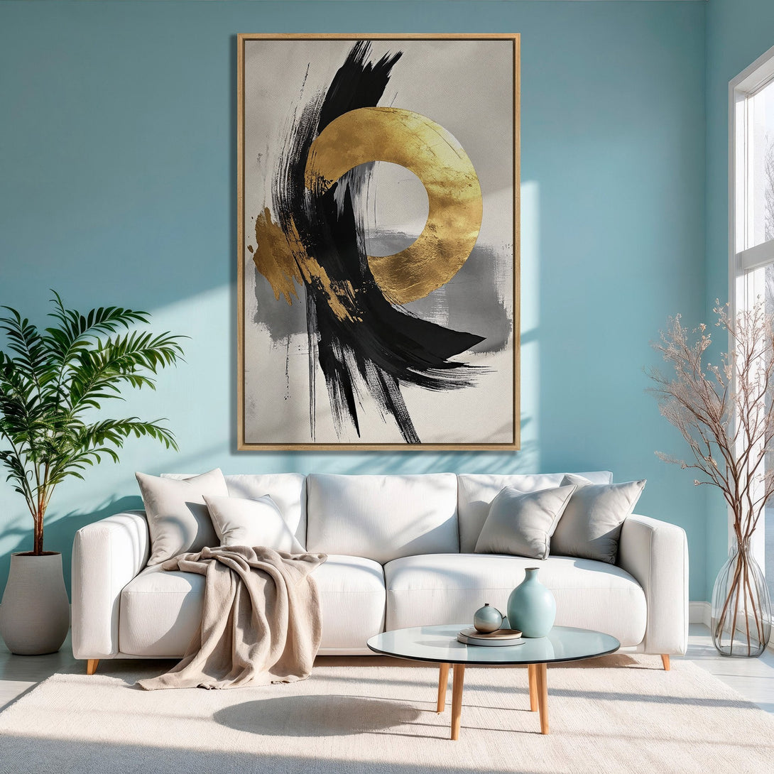 Framed Wall Art: Abstract gold and black brushstroke art, displayed in a modern living room with a calming blue, neutral color palette.
