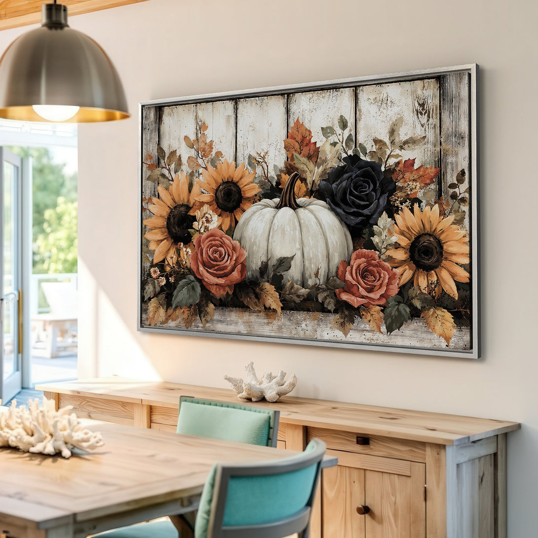 Framed Wall Art: Rustic floral canvas print featuring a white pumpkin, sunflowers, and roses in warm autumn colors. Perfect fall decor!