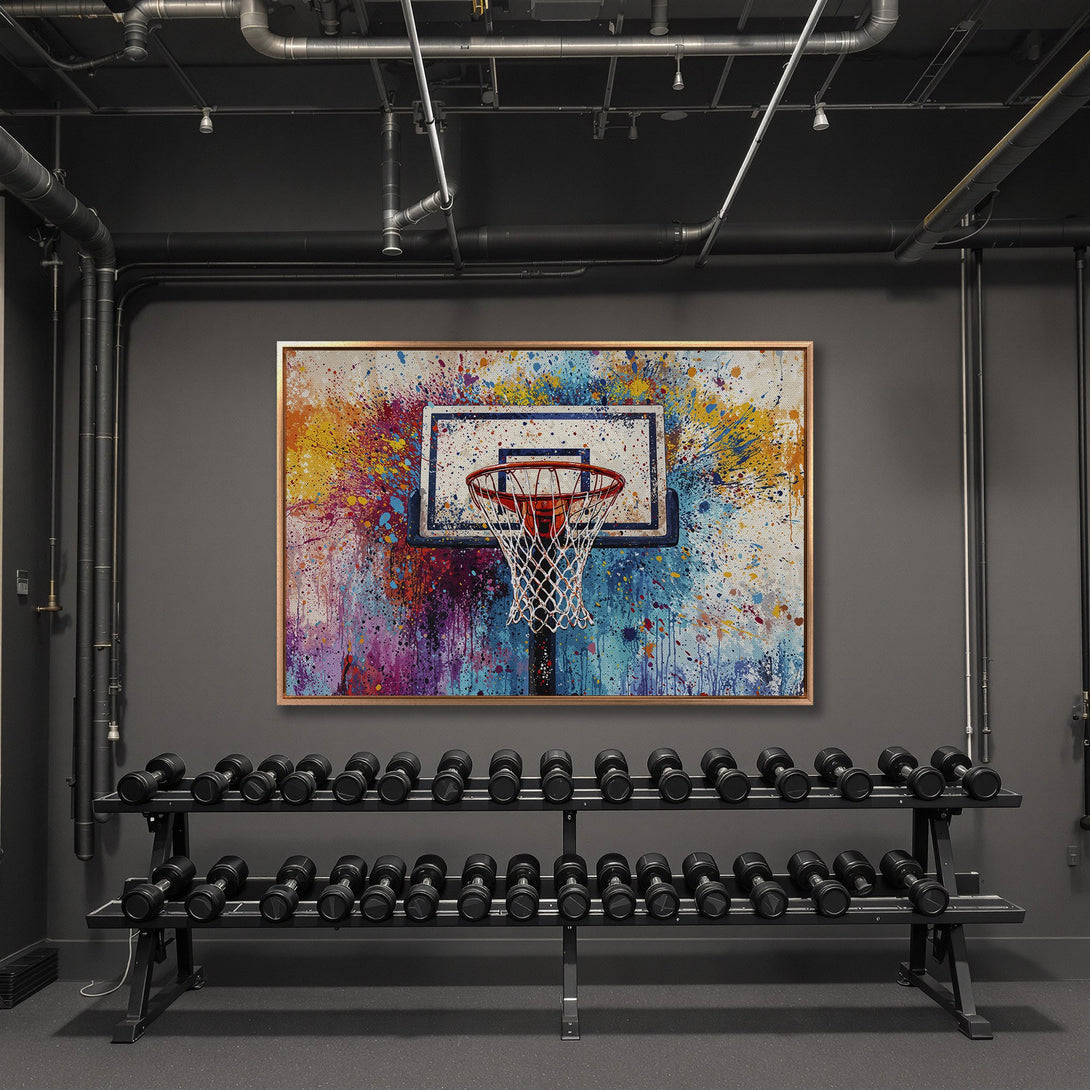 Framed Wall Art: Abstract basketball hoop art with vibrant, colorful paint splatters. Modern decor in a gym setting.