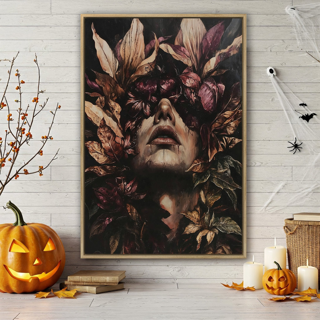 Framed Wall Art featuring a woman's face surrounded by leaves in a dark, moody color palette. Perfect for adding a touch of gothic elegance to your home decor.