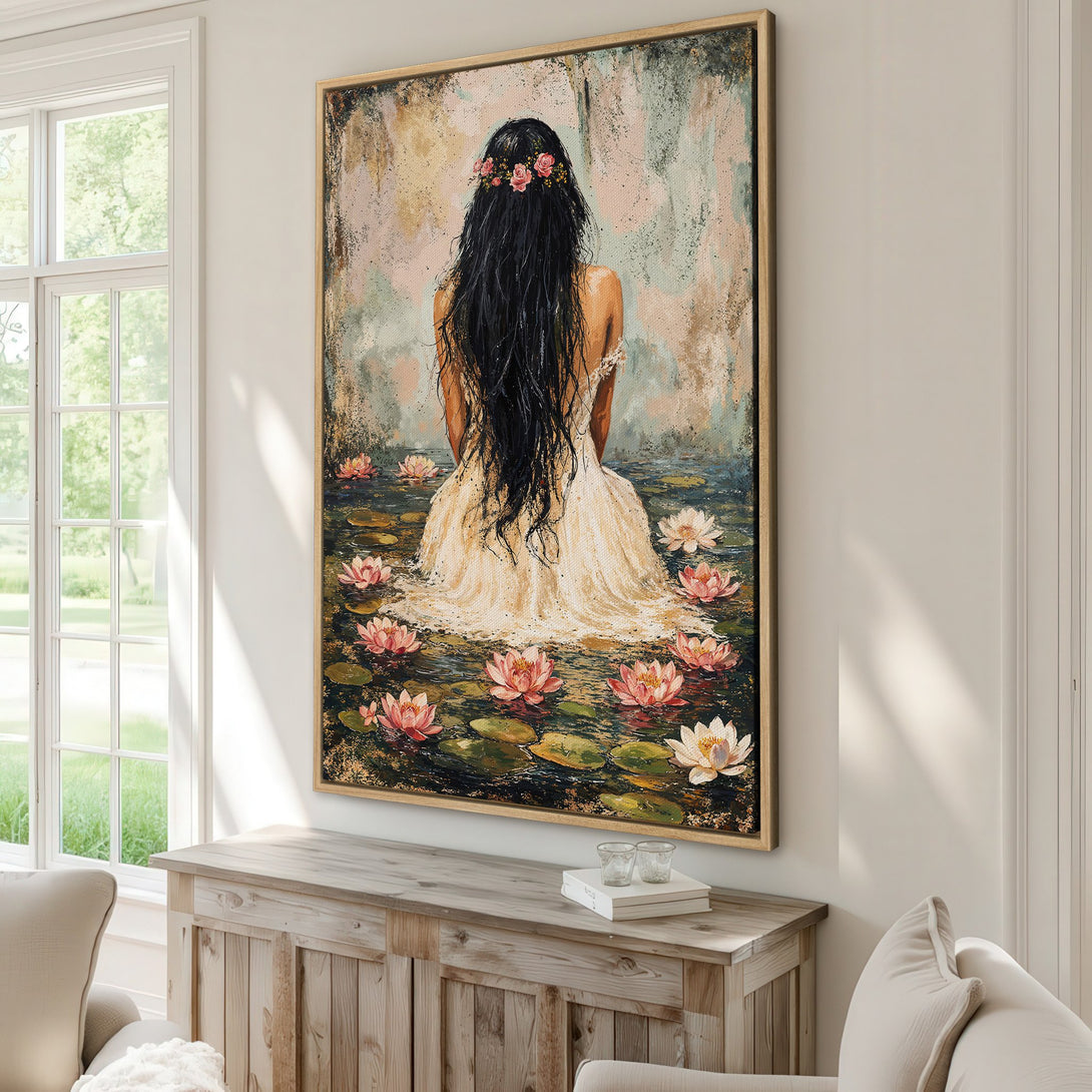 Framed Wall Art Canvas Print featuring a woman in a white dress surrounded by water lilies. Soft, muted color palette. Perfect for adding a touch of serenity.