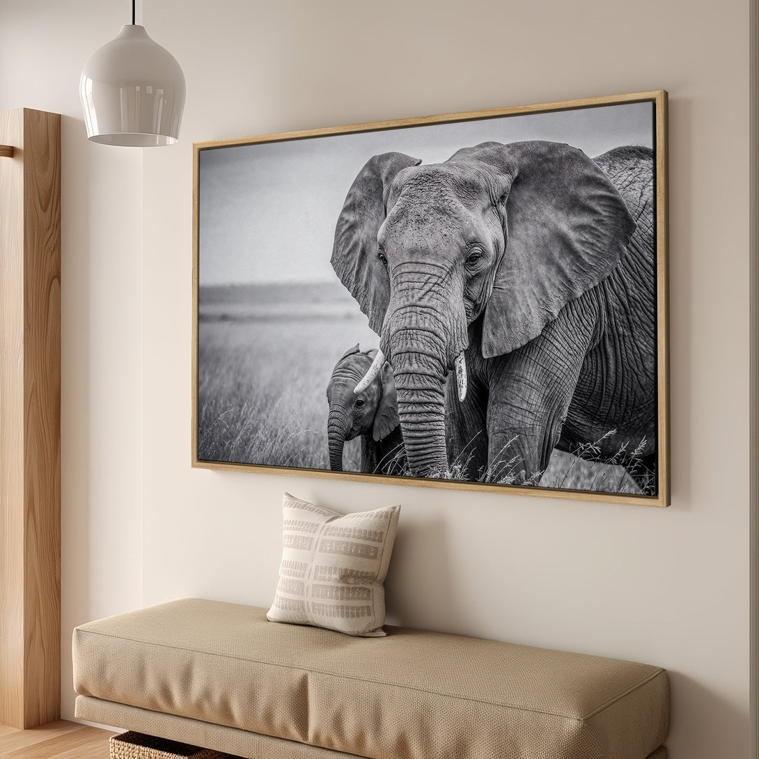Framed Wall Art: Stunning black and white elephant canvas print. Modern wildlife art, neutral tones, perfect for any home decor. Shop now!