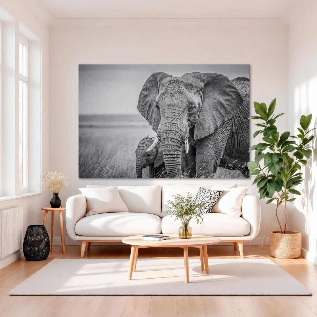 Framed Wall Art: Stunning black and white elephant canvas print. Modern decor with a gold frame, perfect for living rooms. Neutral tones, elegant style.