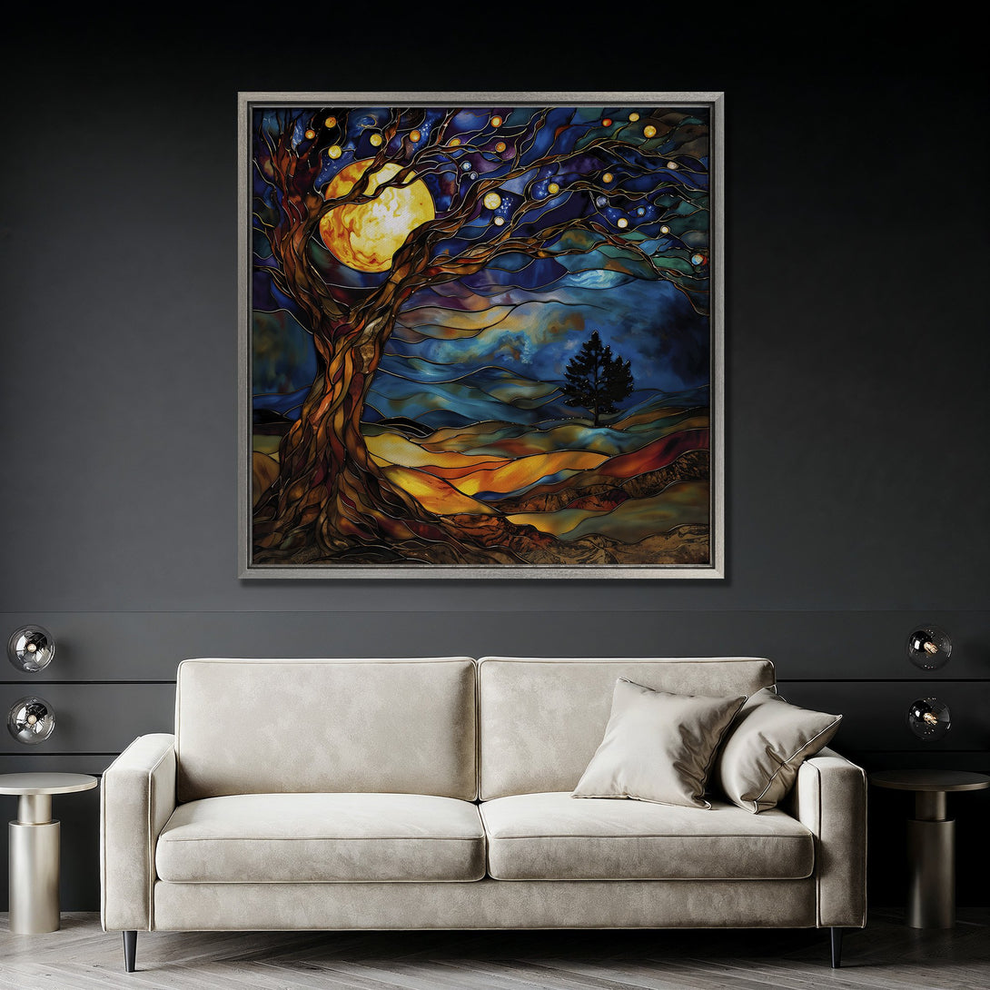 Framed Wall Art: Stained glass style tree with moon, warm orange, brown, and blue tones. Perfect for living room decor.