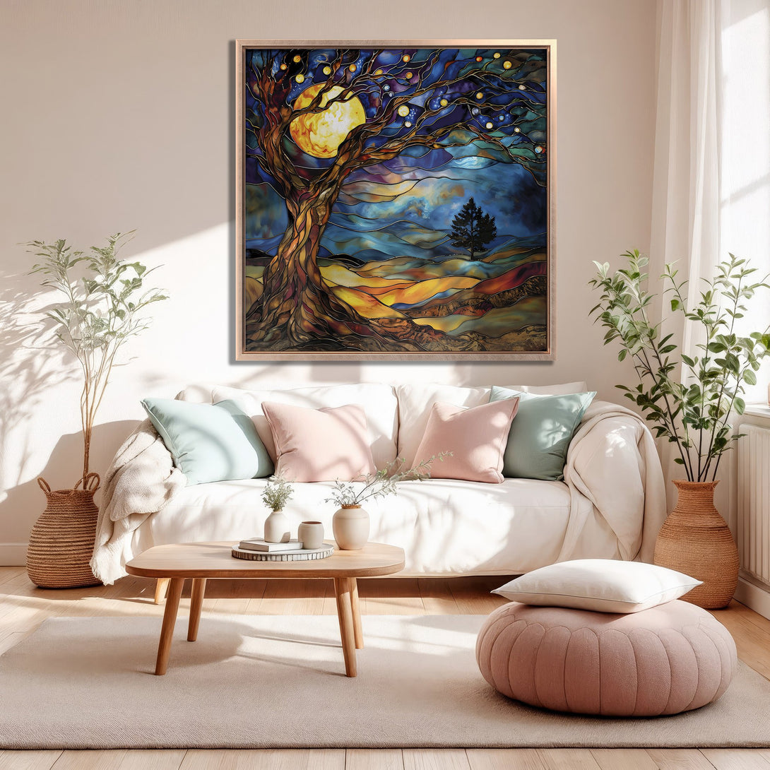 Framed Wall Art: Stained glass style tree with moon. Warm color palette of blues, oranges, and yellows. Perfect for living room decor.