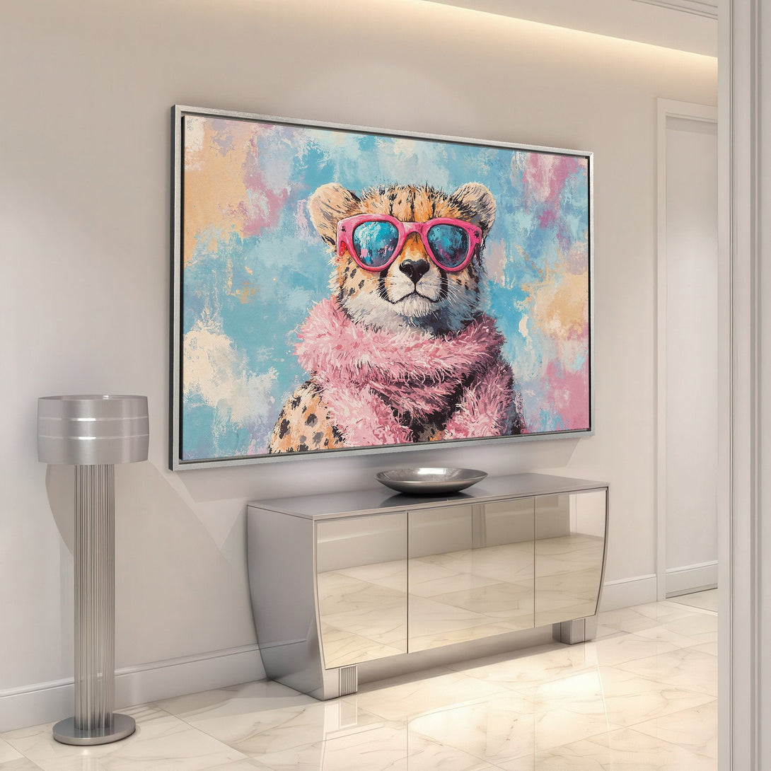 Framed Wall Art: Playful cheetah wearing sunglasses in a colorful, abstract style. Pastel blue, pink, and peach tones create a stylish focal point.