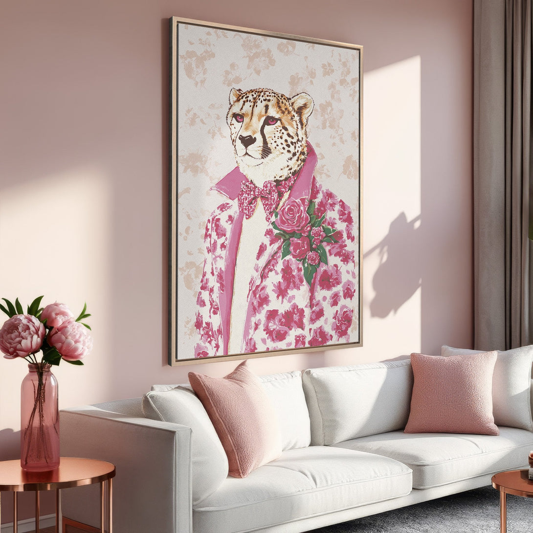 Framed Wall Art featuring a dapper cheetah in pink floral attire. Stylish artwork in a blush and cream color palette, perfect for adding a touch of whimsy.