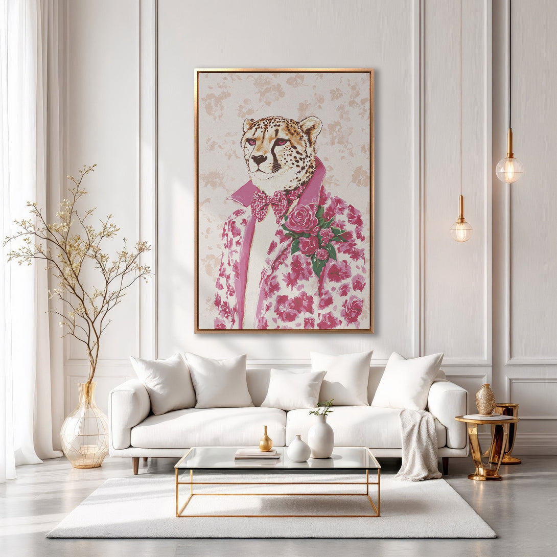 Framed Wall Art featuring a dapper cheetah in a pink floral suit. Stylish, modern art in a white and gold interior, adding a pop of color and personality.