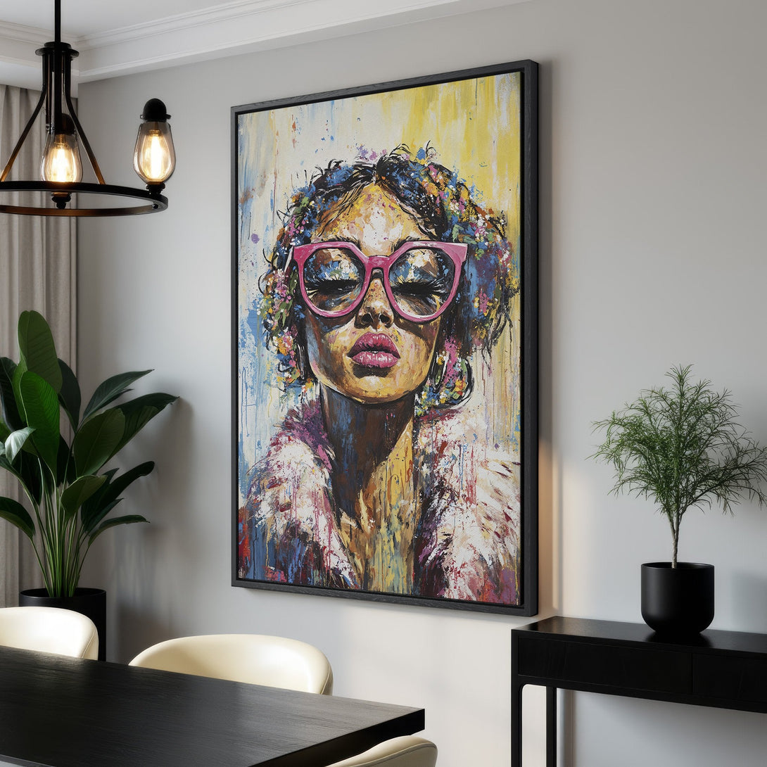 Framed Wall Art: Bold portrait of a woman with pink glasses, vibrant colors, and expressive brushstrokes. Perfect for adding a pop of art to your space!