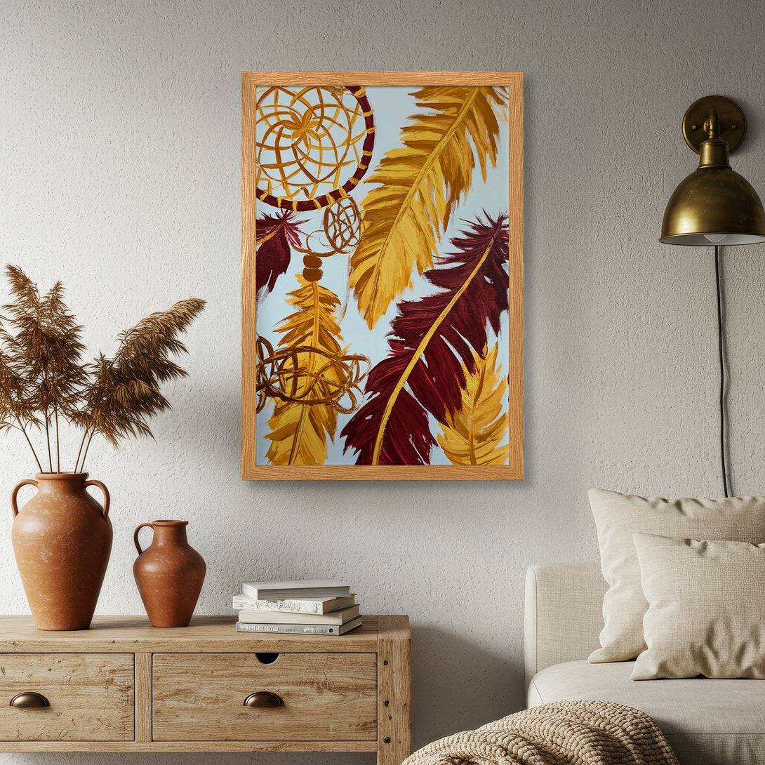 Framed Poster featuring a dreamcatcher and feathers in warm yellow and burgundy hues, modern boho style.