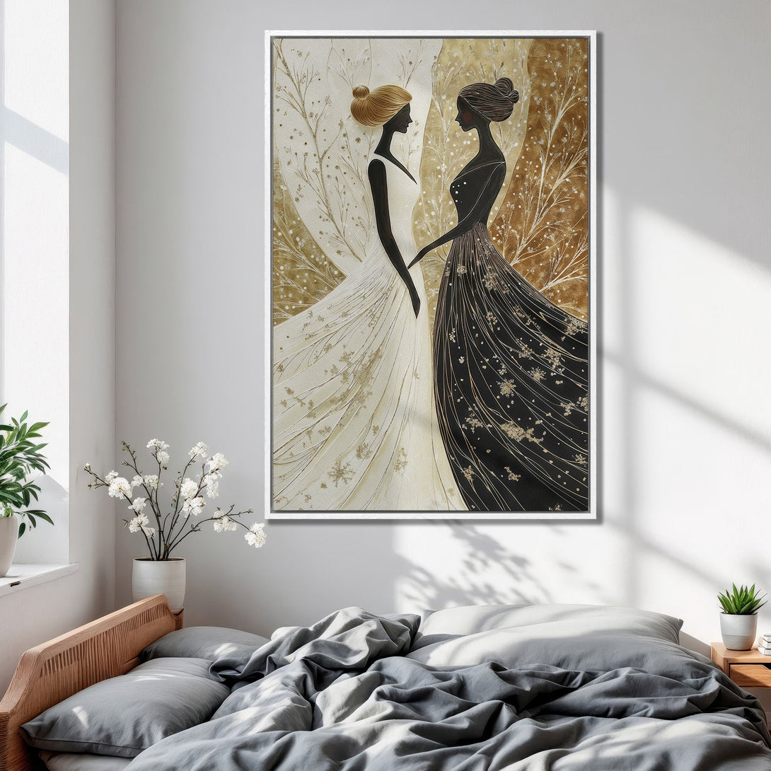 Framed Wall Art featuring two elegant figures in black and white dresses, set against a golden backdrop. Perfect for adding a touch of sophistication.