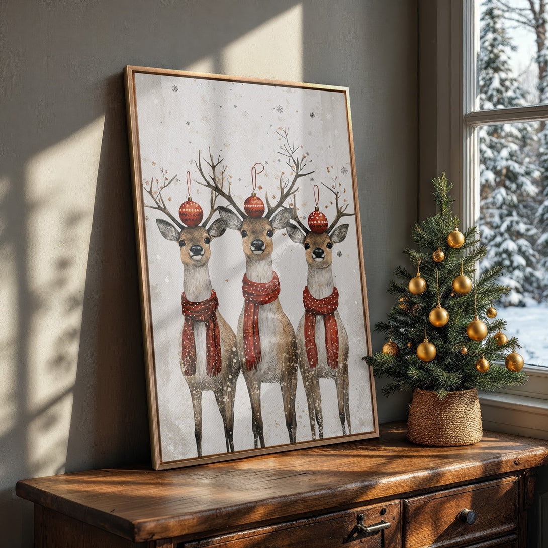 Framed Wall Art featuring watercolor reindeer with red scarves and ornaments, perfect for Christmas decor. Neutral color palette.