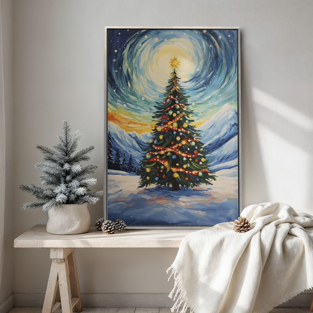 Framed Wall Art: Whimsical Christmas tree painting with a snowy mountain backdrop, featuring a blue, yellow, and green color palette. Perfect holiday decor!