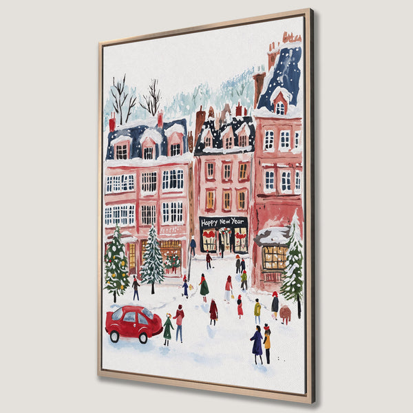 Framed Wall Art featuring a watercolor winter scene with a festive town, red car, and people. Warm pink, blue, and green color palette. Perfect holiday decor!