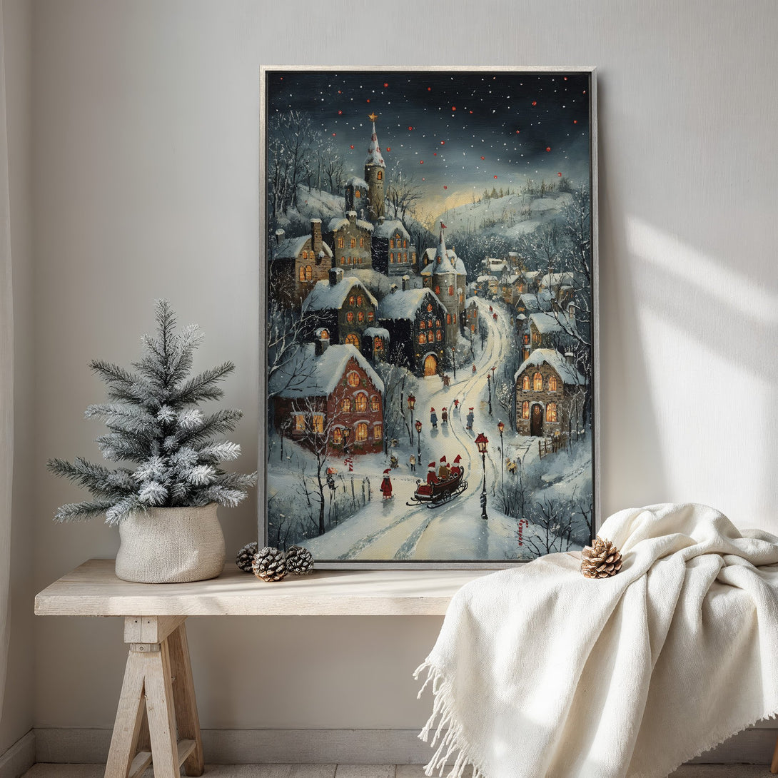 Framed Wall Art: Winter village scene Canvas Print with a cozy, warm color palette. Perfect for Christmas decor and adding a touch of holiday charm.