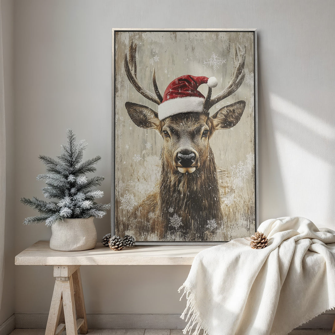 Framed Wall Art: Festive deer wearing a Santa hat, neutral color palette. Rustic Christmas decor, perfect for holiday home accents.