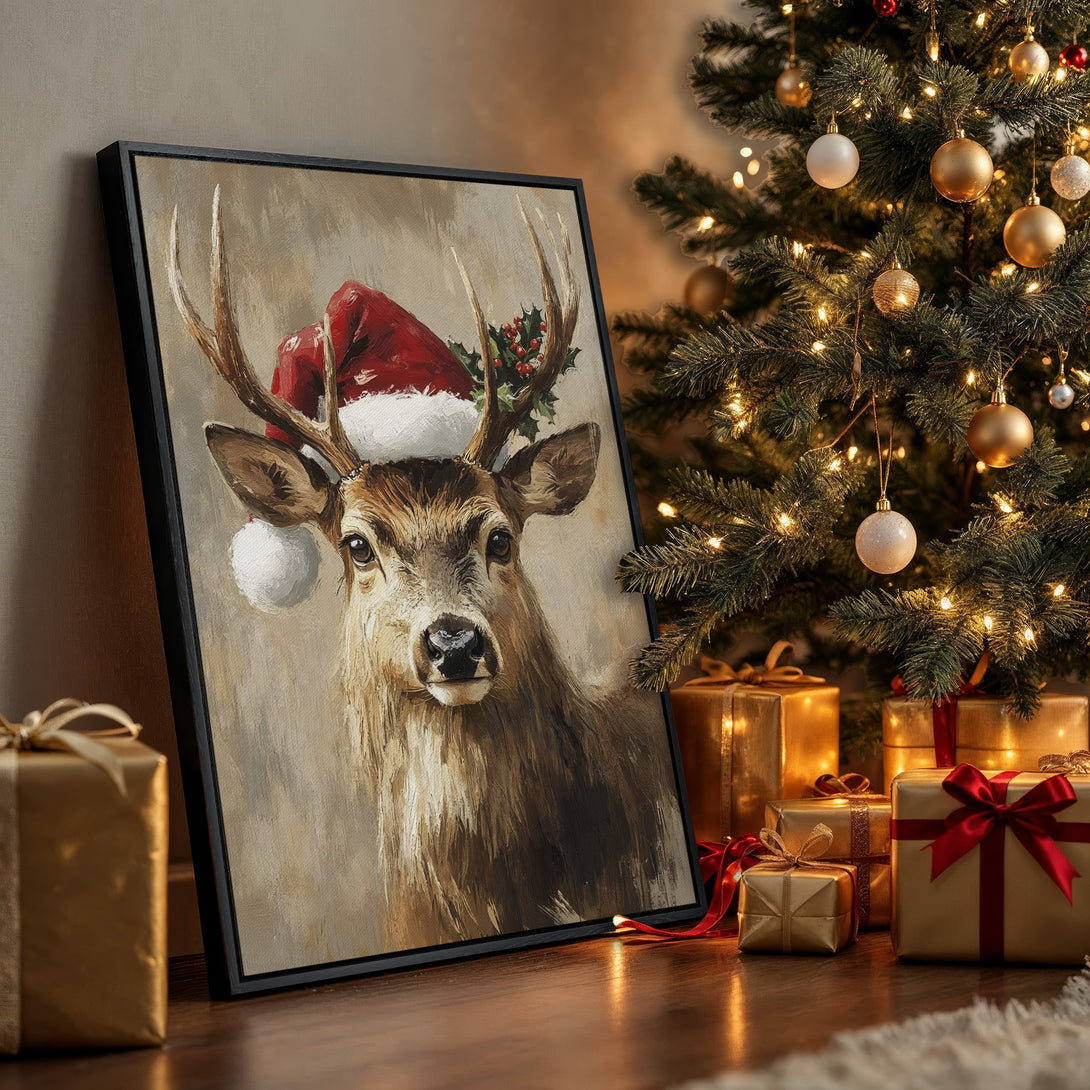 Framed Wall Art: Festive deer in Santa hat, warm neutral tones. Perfect Christmas decor! Adds cozy charm to any space. Shop now for holiday art!