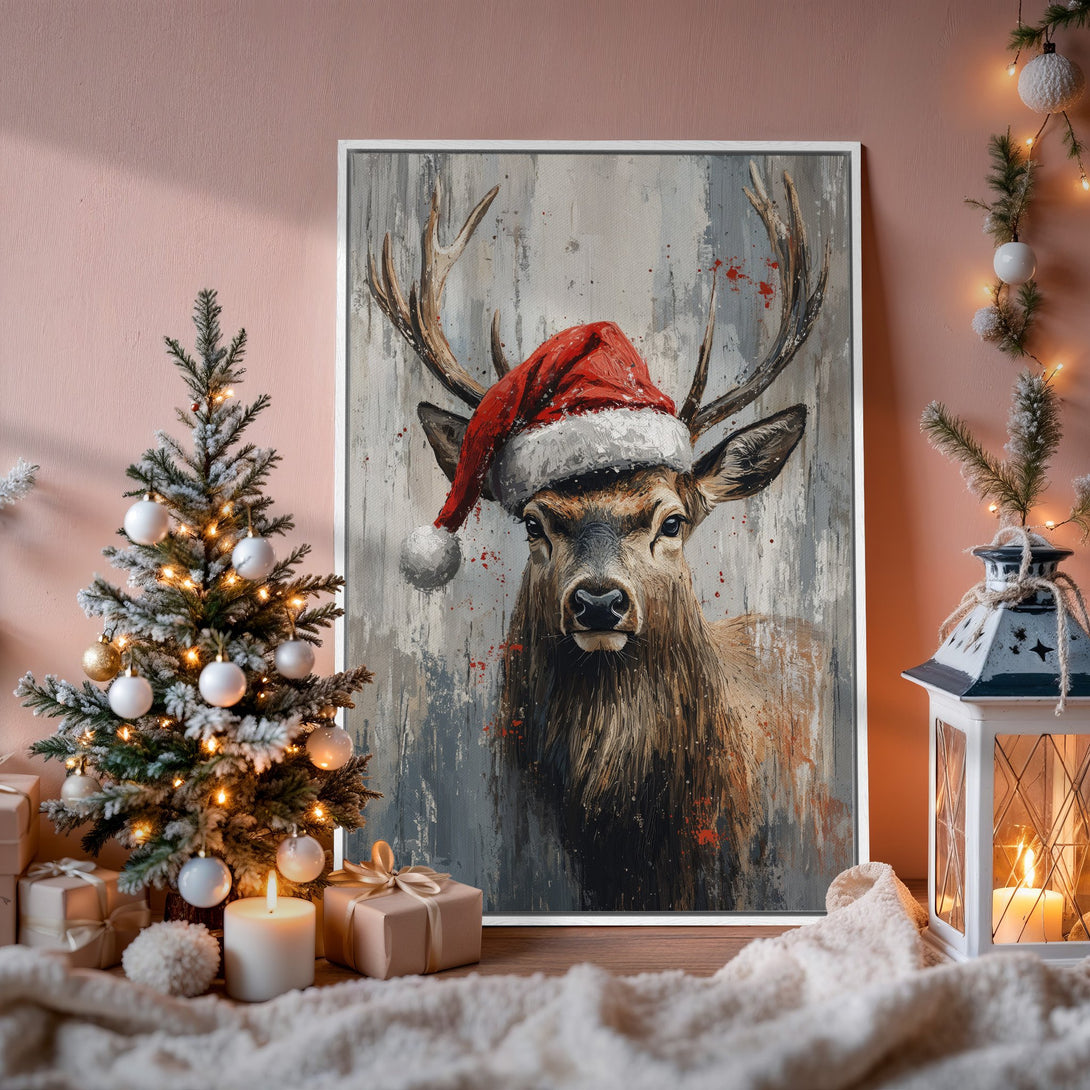Framed Wall Art: Festive deer in Santa hat. Rustic style with brown, gray, and red hues. Perfect Christmas decor for a cozy home.