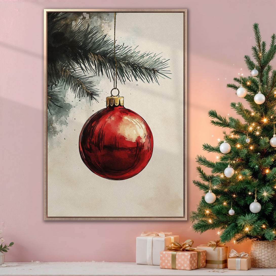 Framed Wall Art: Festive watercolor Christmas ornament in red & gold, displayed in cozy interior. Perfect holiday decor with soft pink & green accents.