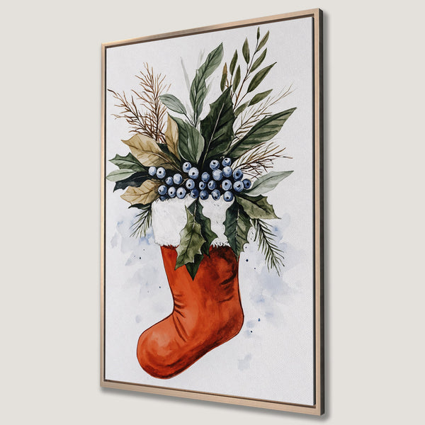 Framed Wall Art featuring a watercolor Christmas stocking filled with greenery and berries. Warm, festive color palette perfect for holiday decor.