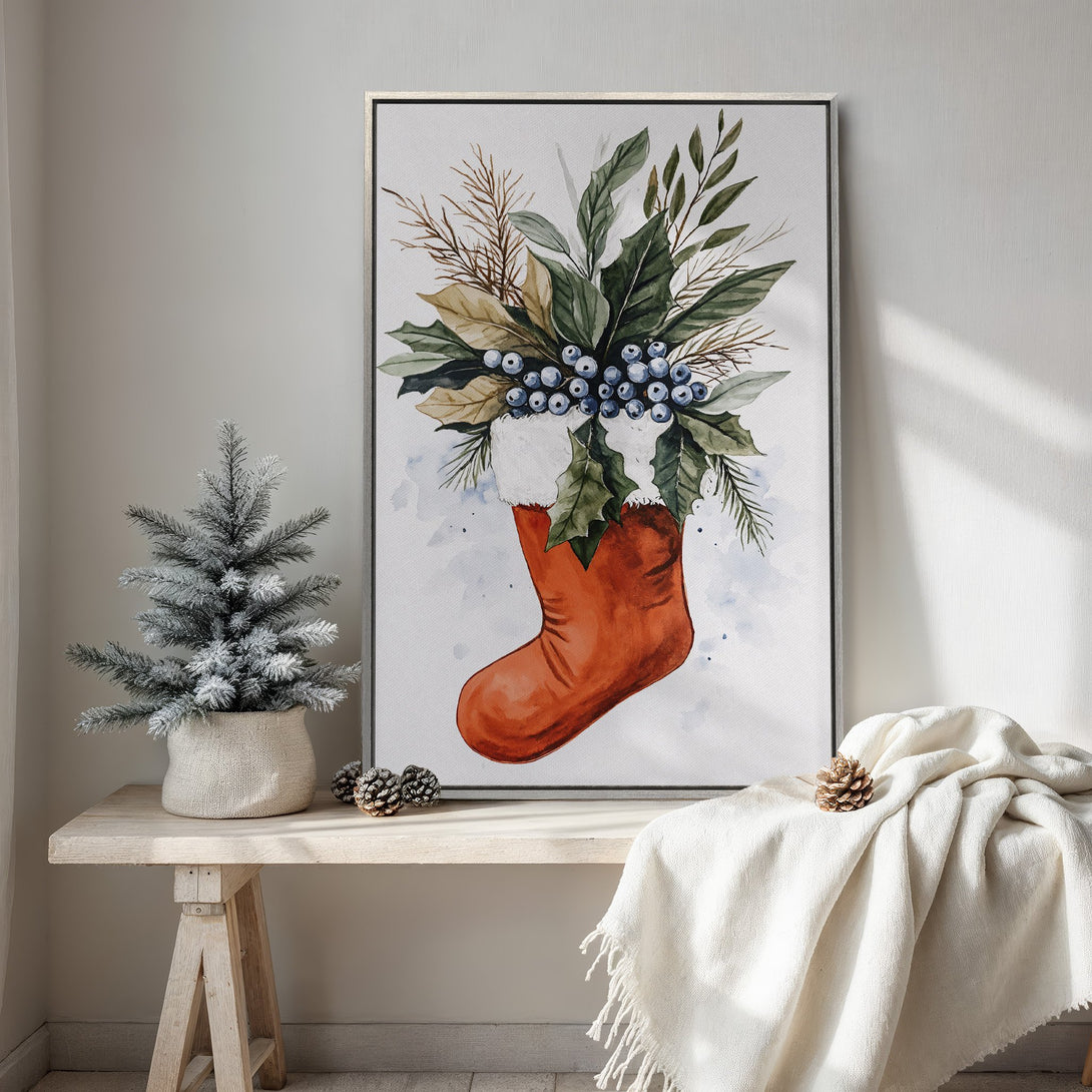 Framed Wall Art featuring a watercolor Christmas stocking with greenery, berries, and a warm color palette. Perfect holiday decor!
