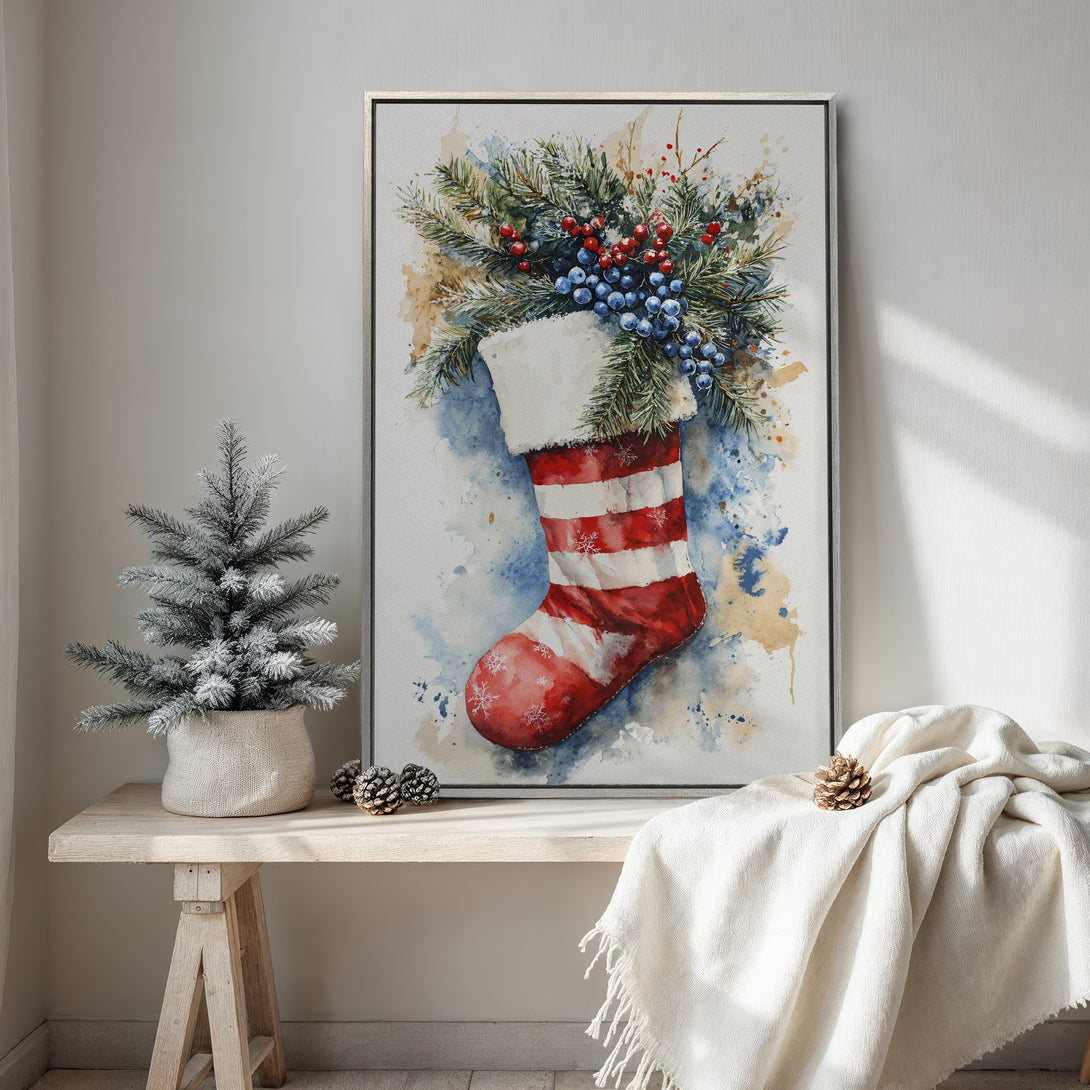 Framed Wall Art: Watercolor Christmas stocking print in red and white. Festive holiday decor with a cozy, warm color palette. Shop now!