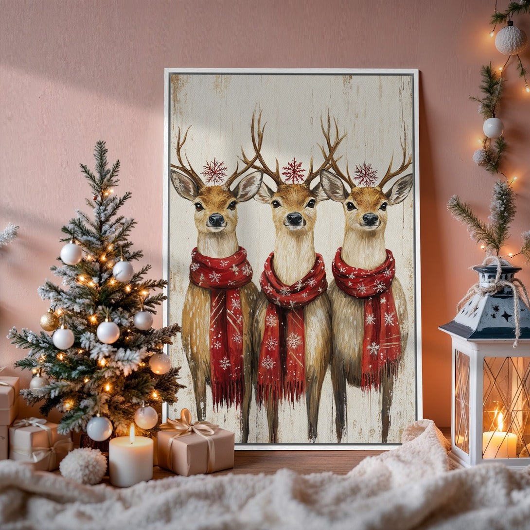 Framed Wall Art: Festive deer painting with red scarves. Warm, cozy color palette perfect for holiday decor. Bring the winter spirit home!
